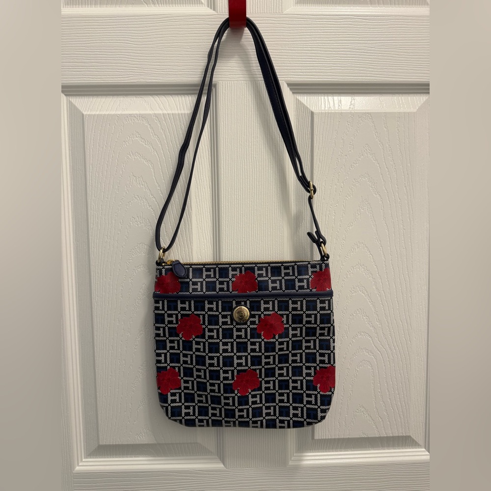 Stylish Navy and Hibiscus Tommy Hilfiger crossbody purse